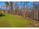 Spacious backyard bordering a wooded area at 746 Whites Farm Rd, Statesville, NC 28625