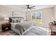 Main bedroom with king-size bed and ceiling fan at 746 Whites Farm Rd, Statesville, NC 28625