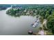 Aerial view showcasing lakefront homes and community boat docks at 3670 West Bay Dr, Sherrills Ford, NC 28673