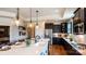 Modern kitchen with white quartz island and stainless steel appliances at 132 Alenda Lux Cir # 7, Mooresville, NC 28115