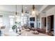 Open kitchen with large island, stainless steel appliances, and breakfast bar at 132 Alenda Lux Cir # 7, Mooresville, NC 28115