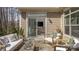 Relaxing outdoor patio with comfortable seating at 132 Alenda Lux Cir # 7, Mooresville, NC 28115