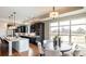 Kitchen dining area with round table and view to backyard at 132 Alenda Lux Cir # 7, Mooresville, NC 28115