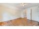 Simple bedroom with hardwood floors and ceiling fan at 430 Dave Lyle Blvd, Rock Hill, SC 29730