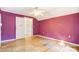 Bright bedroom with hardwood floors and purple walls at 430 Dave Lyle Blvd, Rock Hill, SC 29730