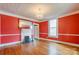 Dining room with hardwood floors, red walls, and a chandelier at 430 Dave Lyle Blvd, Rock Hill, SC 29730