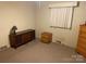 Bedroom with dresser, nightstand, and vintage stereo at 307 Eddleman Rd, Kannapolis, NC 28083