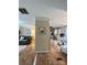 Open living room and kitchen with wood-look floors at 5401 Stevens Mill Rd, Matthews, NC 28104