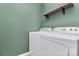 Laundry room with side-by-side washer and dryer at 5952 Carrollton Ln, Charlotte, NC 28210