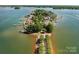 Private island community with lakefront homes and boat docks at 3446 Governors Island Dr, Denver, NC 28037