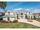 Two-story home with large windows and attached garage at 3446 Governors Island Dr, Denver, NC 28037