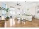 Living area with hardwood floors, sectional sofa, and lake views at 3446 Governors Island Dr, Denver, NC 28037