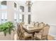 Elegant dining room with lake view and seating for twelve at 3446 Governors Island Dr, Denver, NC 28037