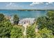 Lakefront property with expansive views and lush landscaping at 3446 Governors Island Dr, Denver, NC 28037