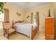 Bedroom with wood furniture and neutral wall colors at 4008 Broadwing Ct, Gastonia, NC 28056