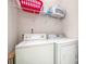 Laundry room with washer, dryer, and overhead shelving at 2005 Germany Dr, Dallas, NC 28034