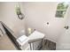 View of a staircase with chandelier and neutral color tones at 2005 Germany Dr, Dallas, NC 28034