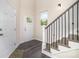 Bright entryway with hardwood floors and a view of the staircase at 2005 Germany Dr, Dallas, NC 28034