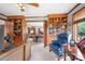 Spacious home office with built-in shelving and comfortable seating at 4299 Randleman Rd, Iron Station, NC 28080