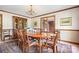 Formal dining room featuring a wood table and chandelier at 4299 Randleman Rd, Iron Station, NC 28080