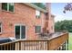 Deck with patio furniture and sliding glass doors at 4299 Randleman Rd, Iron Station, NC 28080