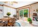 Cozy dining area with wood table and access to backyard deck at 4299 Randleman Rd, Iron Station, NC 28080