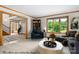 Living room with large windows, offering abundant natural light at 4299 Randleman Rd, Iron Station, NC 28080
