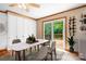 Kitchen dining area with sliding glass door leading to deck at 4299 Randleman Rd, Iron Station, NC 28080