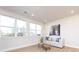 Bright living room with hardwood floors, large windows, and comfy seating at 1530 Levy Way, Charlotte, NC 28205
