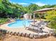 Relaxing pool and spa area with pergola and lounge chairs at 8534 Headford Rd, Charlotte, NC 28277
