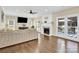 Living room with hardwood floors, fireplace and large windows at 8534 Headford Rd, Charlotte, NC 28277