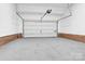 Attached garage with ample space for parking and storage at 8534 Headford Rd, Charlotte, NC 28277