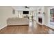 Bright living room with hardwood floors and large windows at 8534 Headford Rd, Charlotte, NC 28277