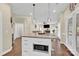 Kitchen island with built-in microwave and breakfast bar at 8534 Headford Rd, Charlotte, NC 28277