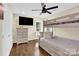 Bedroom with a bunk bed, dresser, and hardwood floors at 8534 Headford Rd, Charlotte, NC 28277