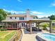House backyard with deck, pergola, and hot tub at 8534 Headford Rd, Charlotte, NC 28277