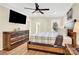 Bright bedroom featuring a large TV and wood floors at 8534 Headford Rd, Charlotte, NC 28277