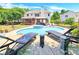 Luxury pool and spa with lounge chairs and backyard view at 8534 Headford Rd, Charlotte, NC 28277