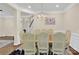Bright dining room with chandelier and seating for eight at 8534 Headford Rd, Charlotte, NC 28277