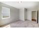 Bedroom with carpet, neutral walls, and door to hallway at 8748 Acadia Pkwy # 604, Sherrills Ford, NC 28673