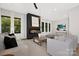 Spacious living room featuring a modern fireplace and ample natural light at 518 Ideal Way, Charlotte, NC 28203