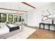 Bright bedroom with hardwood floors, large windows, and stylish decor at 518 Ideal Way, Charlotte, NC 28203