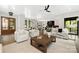 Open-concept living room with high ceilings and a view into the kitchen at 518 Ideal Way, Charlotte, NC 28203
