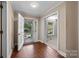 Bright entryway with tiled floor and view of front door at 866 Concord Rd, Davidson, NC 28036