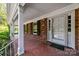 Front entrance with brick columns and tiled floor at 866 Concord Rd, Davidson, NC 28036