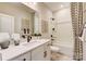 Clean bathroom featuring a bathtub and vanity with modern fixtures at 105 Goodson Pl, Davidson, NC 28036