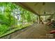 Peaceful patio with lake views and comfortable lounge seating at 80 Fairview Farms Rd, Shelby, NC 28150