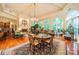 Grand living room featuring hardwood floors, a fireplace, and abundant natural light at 80 Fairview Farms Rd, Shelby, NC 28150