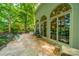 Spacious stone patio with ample seating, overlooking a wooded area at 80 Fairview Farms Rd, Shelby, NC 28150