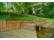 Wooden deck and stairs leading to the lake at 80 Fairview Farms Rd, Shelby, NC 28150